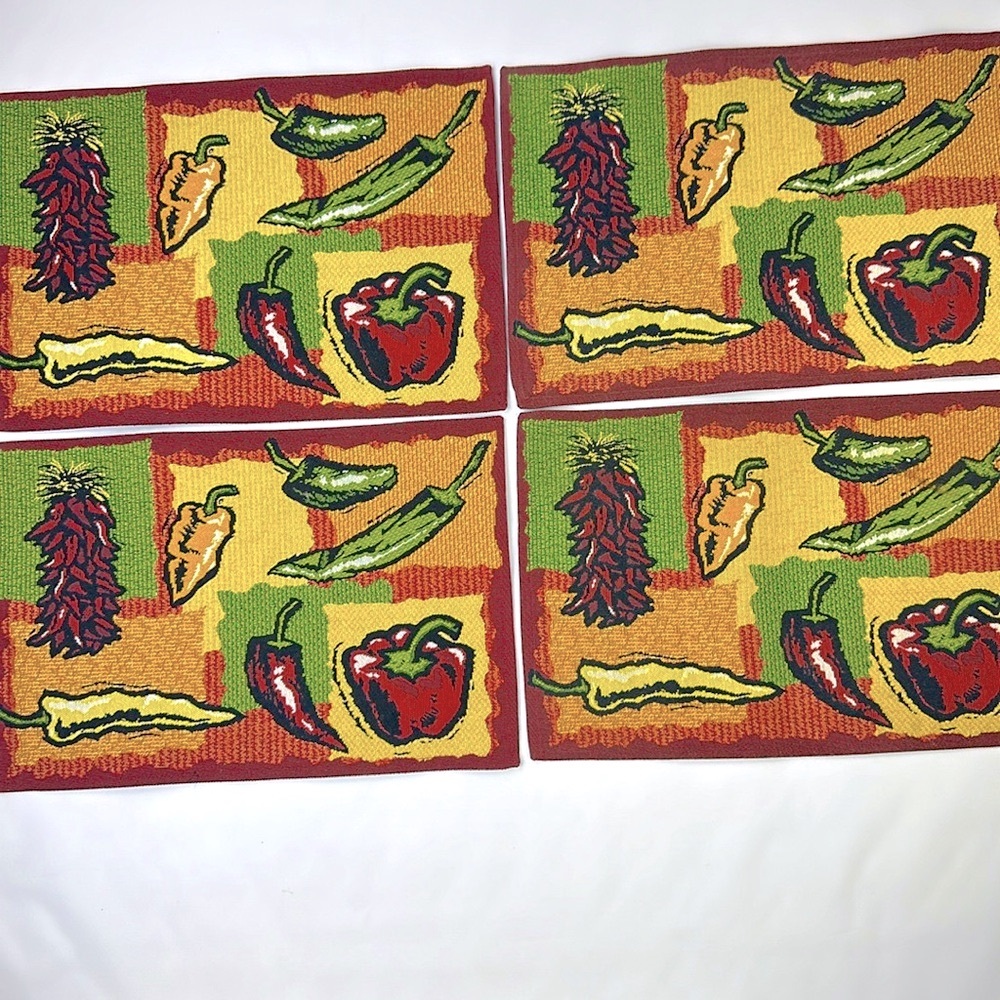 Set of 4 Pepper Embroidered Place Mats. Used for decoration only. 19”L x 12.5W.
